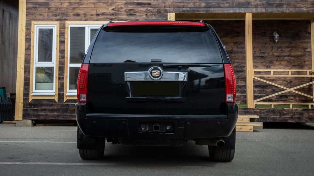 20 литров и 6,5 секунд: опыт владения Cadillac Escalade 2008 года